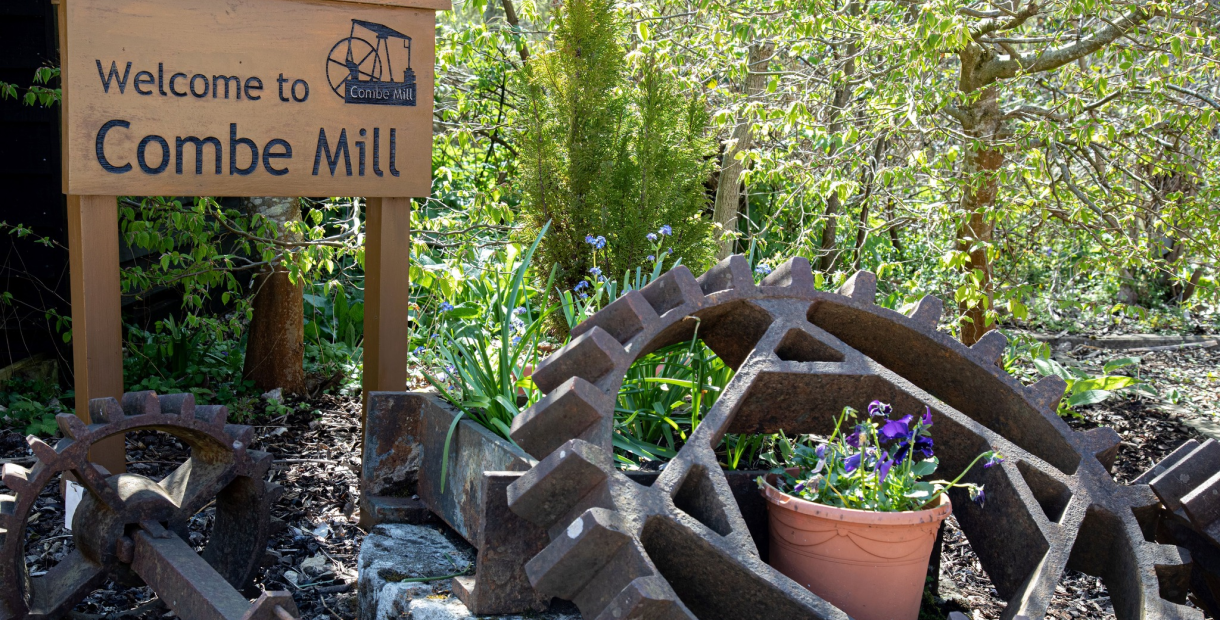 Welcome to Combe Mill sign